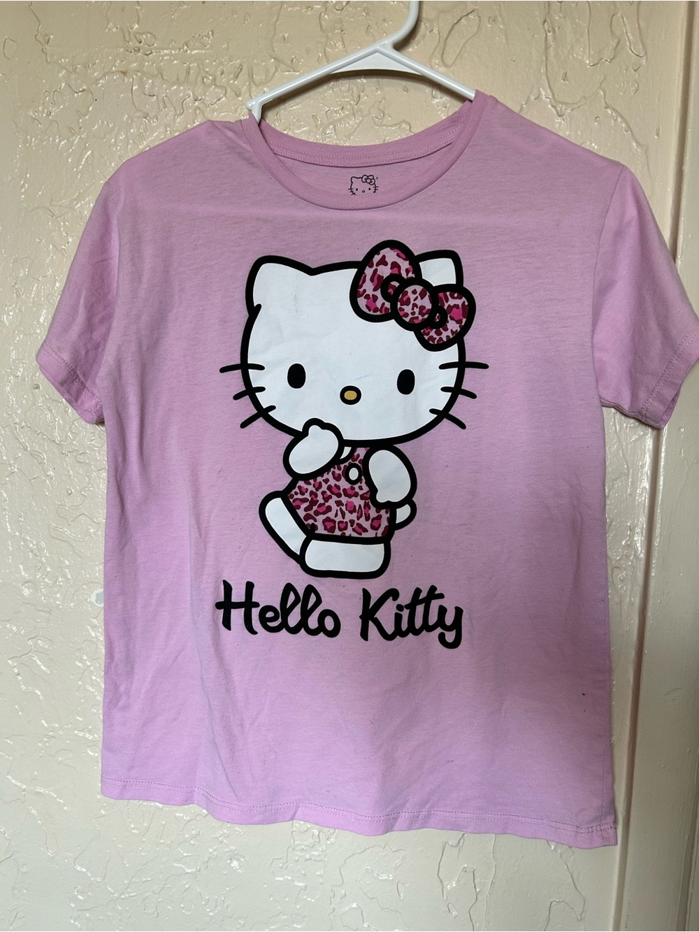 Hello Kitty Light Pink Tee with Leopard Bow Graphic